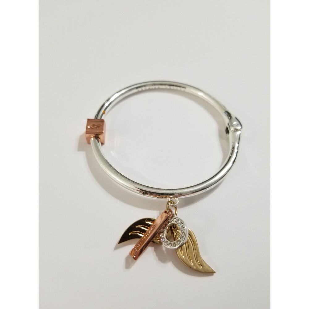 Two signed Ashley Bridget Bracelets one goldtone one silvertone*